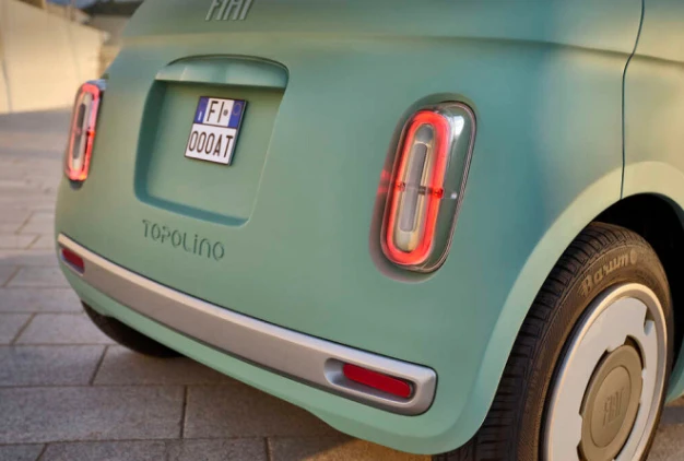 Silver detailing at front and rear
